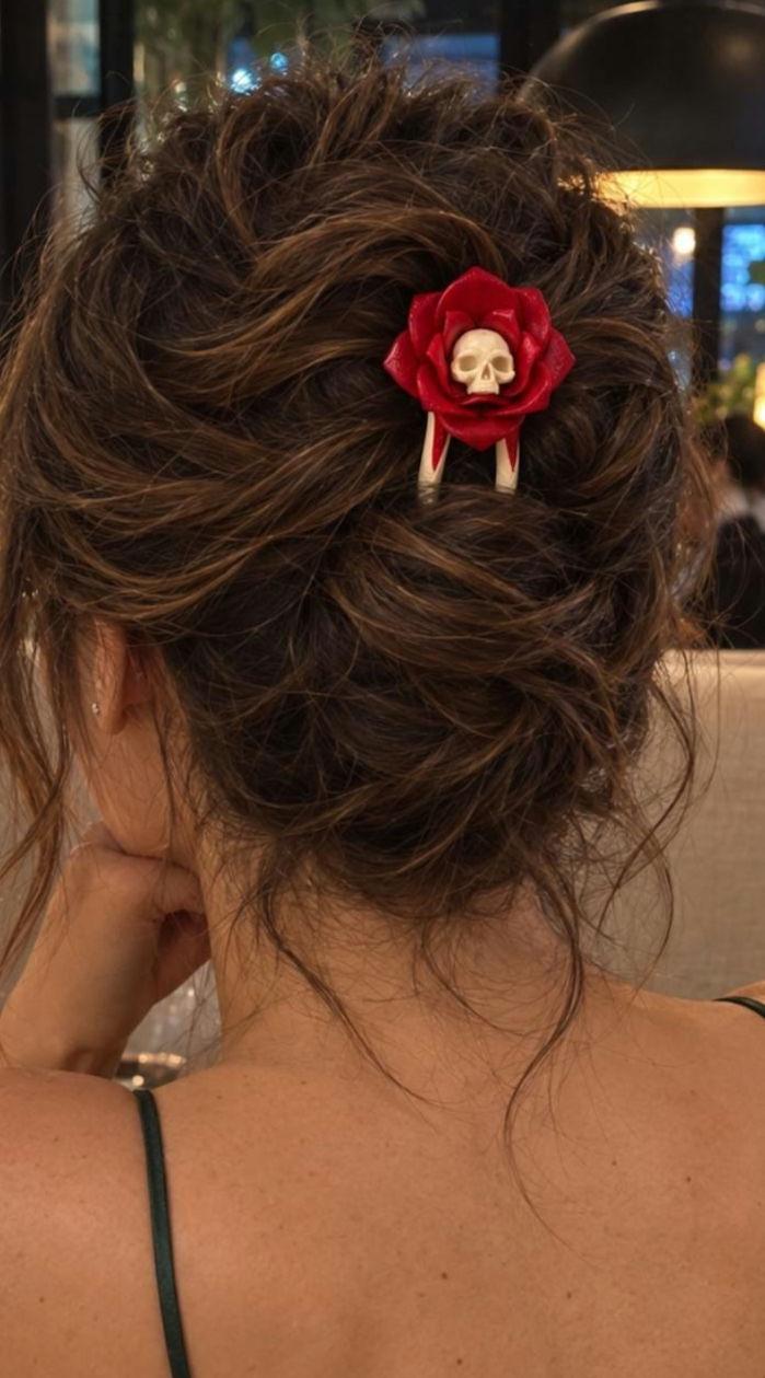 Death Blossom skull and red rose hair pin worn in a bun