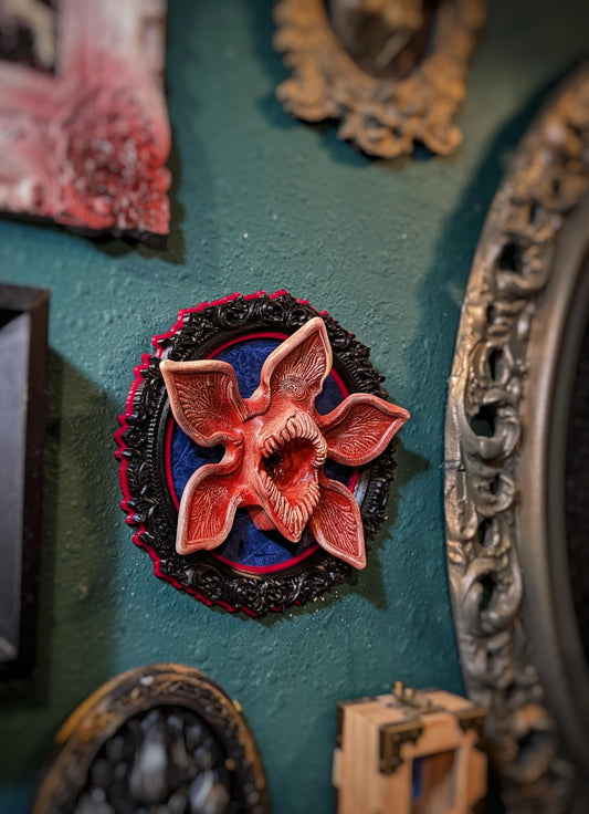 Demogorgon art piece in baroque frame