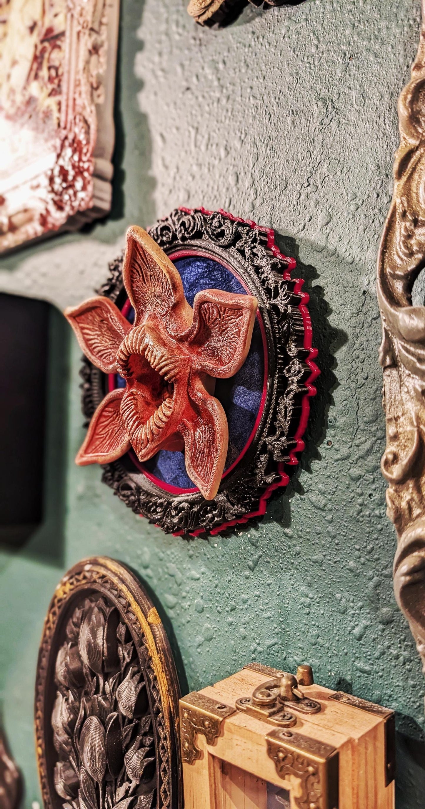 Demogorgon art piece in baroque frame